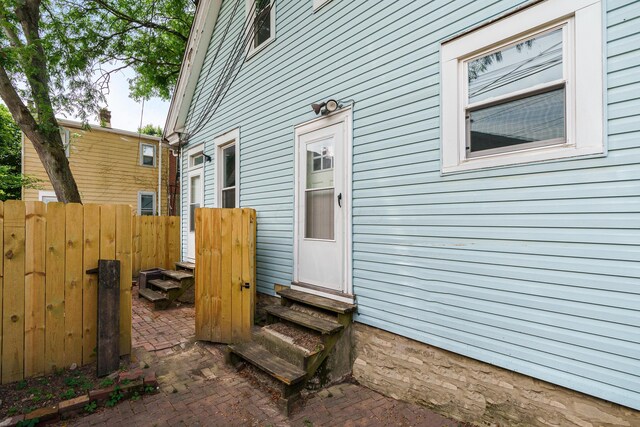 property entrance with a patio area