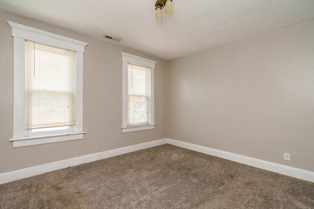 view of carpeted spare room