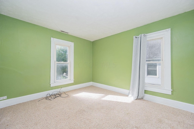 view of carpeted spare room