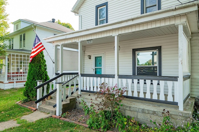 entrance to property with covered porch