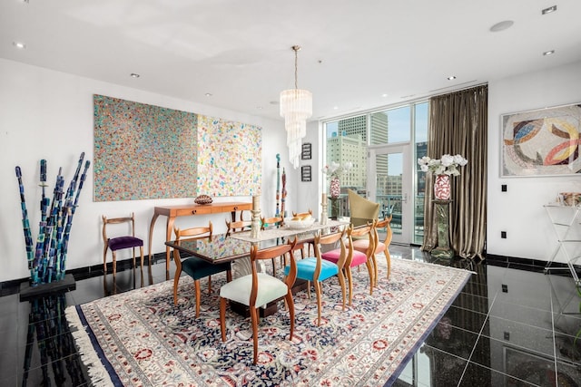 dining space with expansive windows and a chandelier