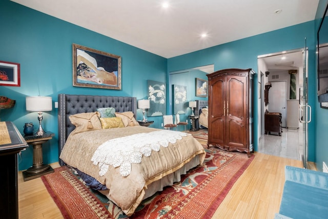 bedroom featuring light hardwood / wood-style flooring