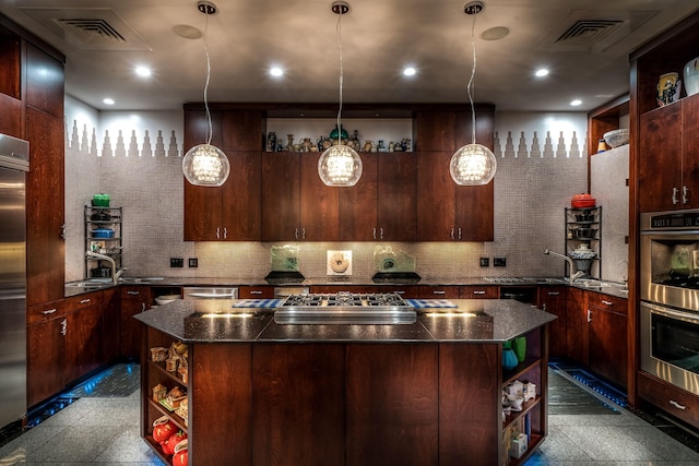 bar with decorative light fixtures, dark brown cabinets, sink, and appliances with stainless steel finishes