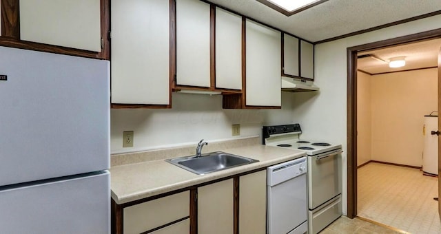 kitchen with sink, crown molding, a textured ceiling, white appliances, and white cabinets