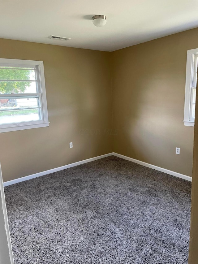 view of carpeted spare room