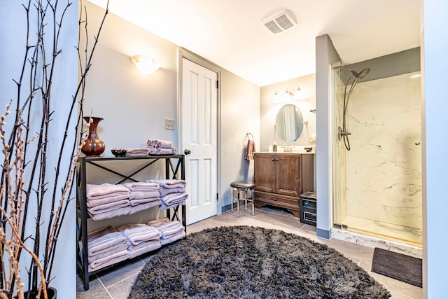 bathroom with vanity and walk in shower