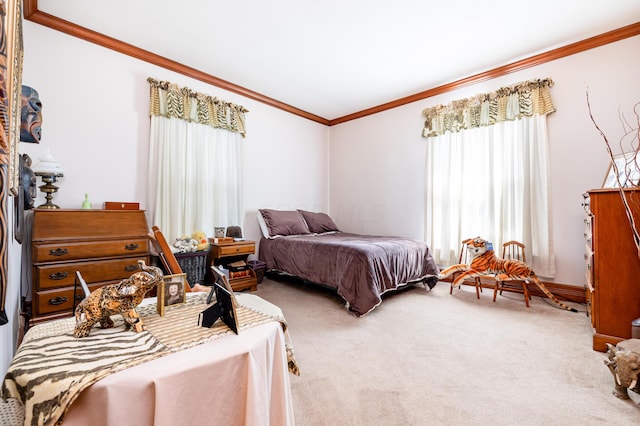 carpeted bedroom featuring ornamental molding