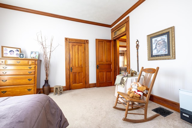 carpeted bedroom featuring crown molding