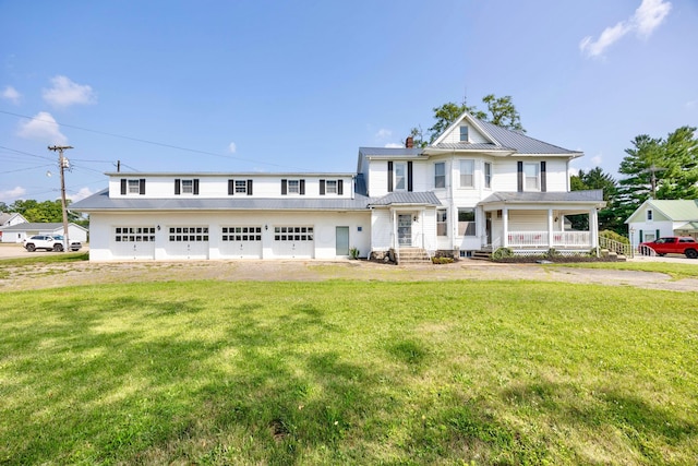 view of front of property with a porch and a front yard