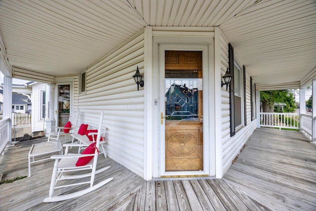 wooden deck featuring a porch