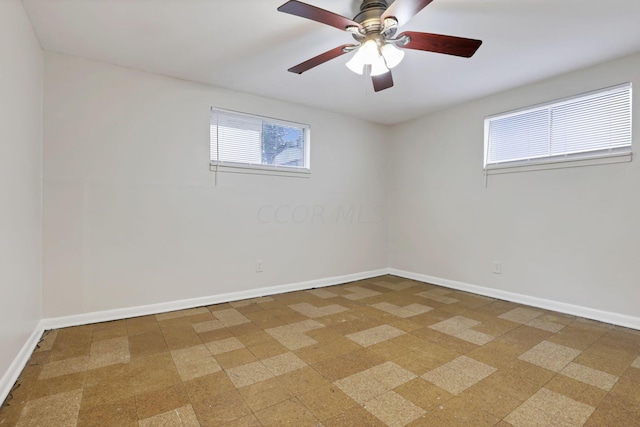 empty room featuring ceiling fan