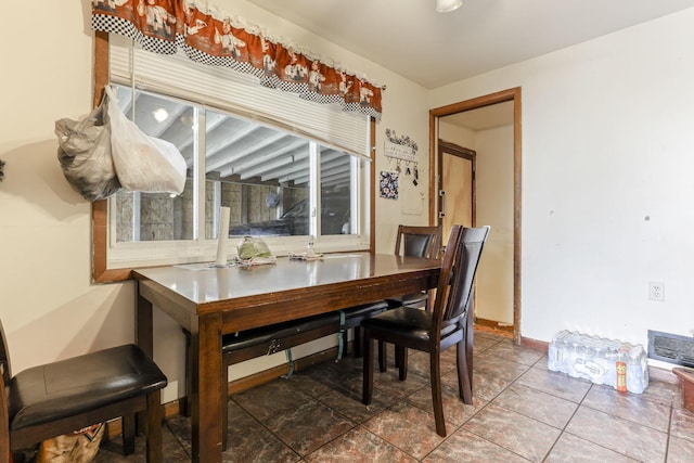 view of tiled dining room