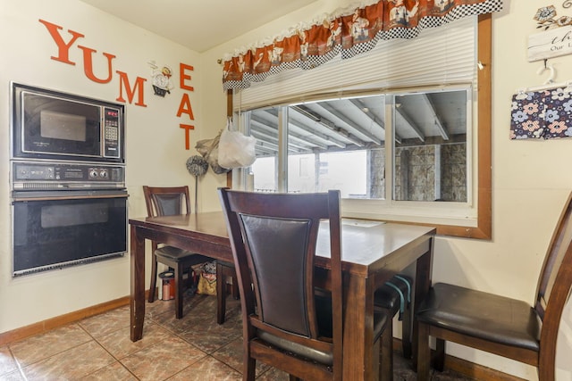 view of tiled dining area