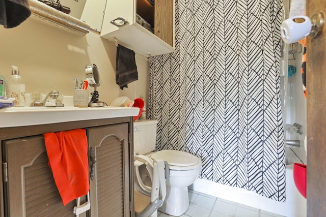 bathroom featuring walk in shower, vanity, and toilet