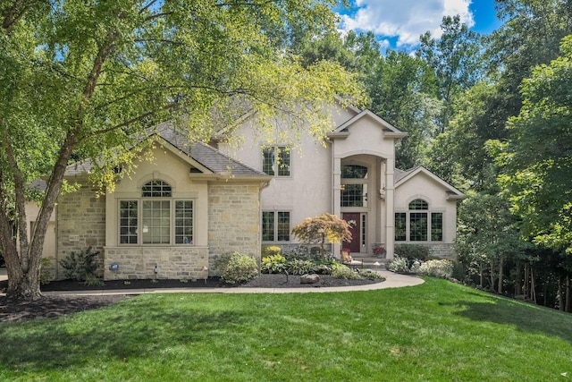 view of front of home with a front lawn