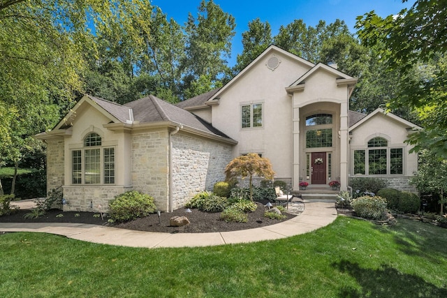 view of front of property with a front lawn