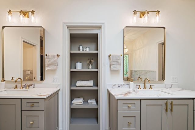 bathroom with vanity and built in features