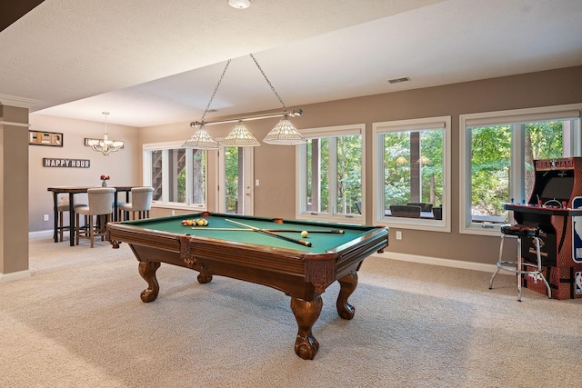 recreation room featuring carpet flooring, a textured ceiling, billiards, and an inviting chandelier