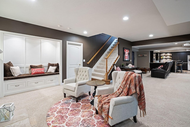 living room with light colored carpet