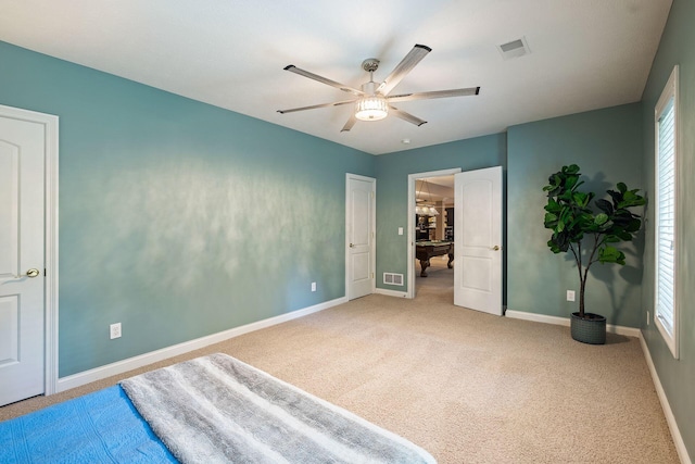 carpeted bedroom with ceiling fan