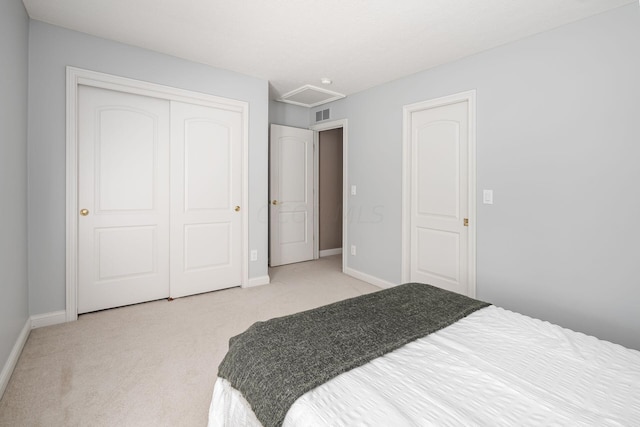 carpeted bedroom with a closet