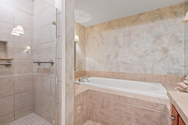 bathroom featuring separate shower and tub and vanity