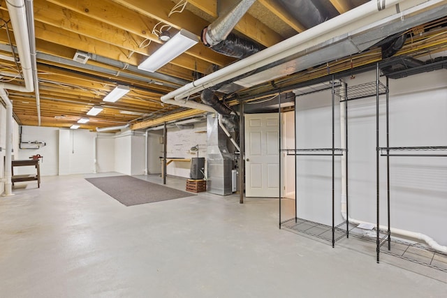 basement with heating unit