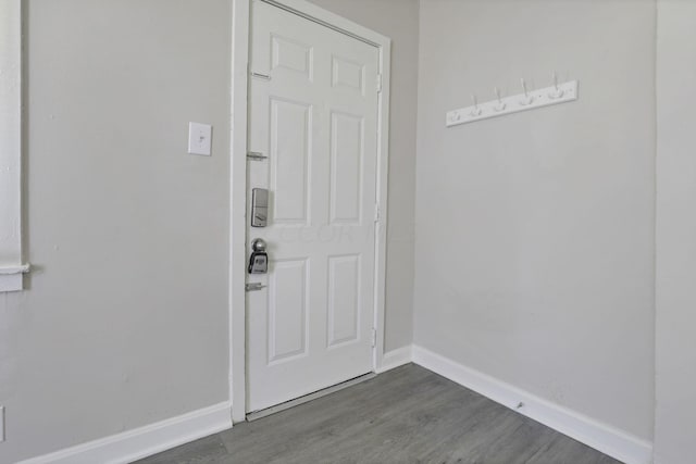 entryway with hardwood / wood-style flooring