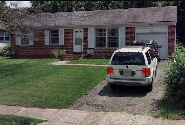 single story home with a garage and a front yard