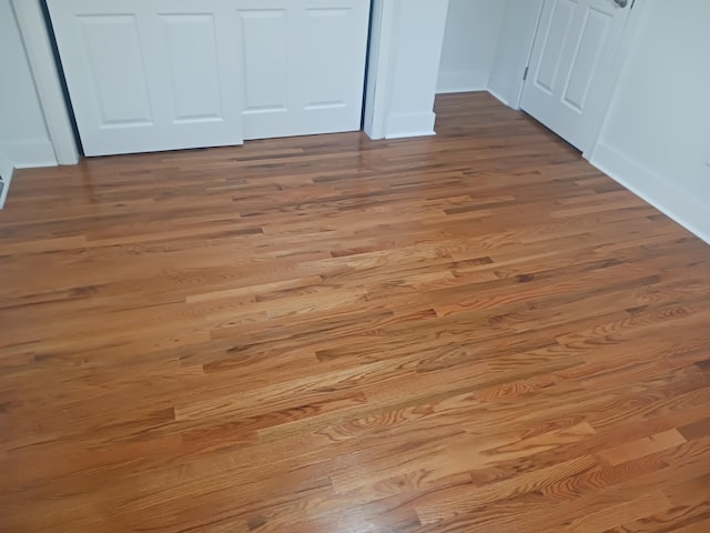 interior details featuring hardwood / wood-style floors