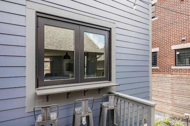 view of property exterior with french doors