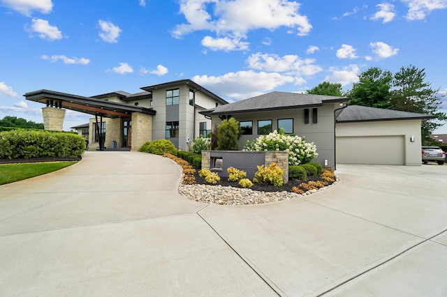 prairie-style home featuring a garage