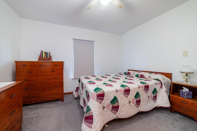 bedroom featuring ceiling fan and light carpet