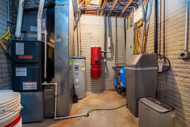 utility room featuring water heater