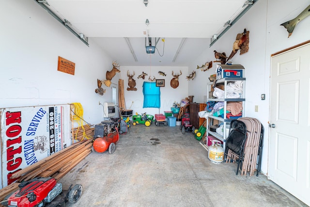 garage featuring a garage door opener