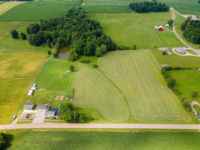 bird's eye view featuring a water view and a rural view