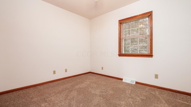 view of carpeted spare room