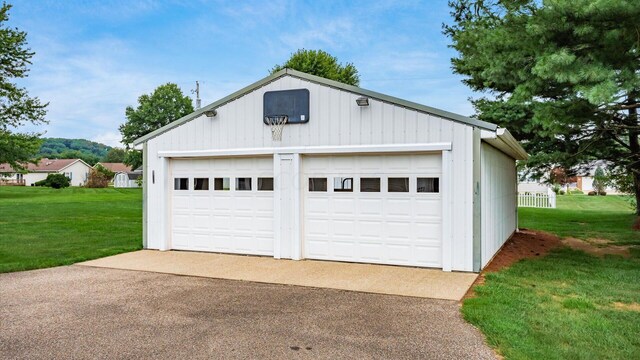 garage with a lawn