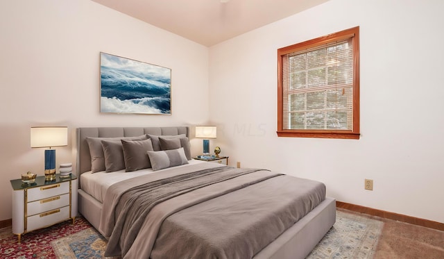 bedroom featuring carpet flooring