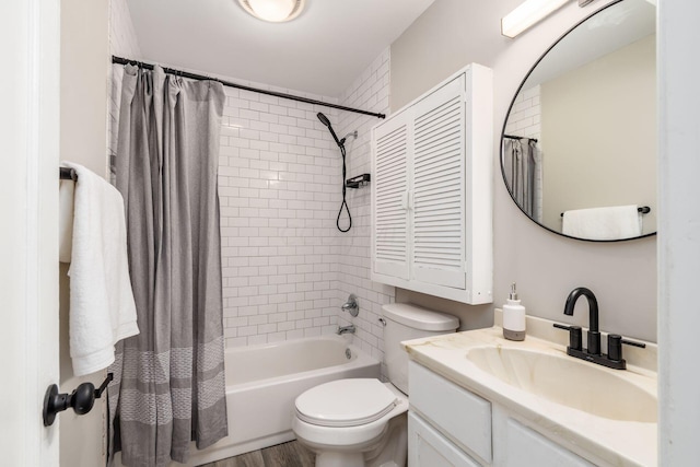 full bathroom featuring vanity, toilet, wood-type flooring, and shower / bath combo