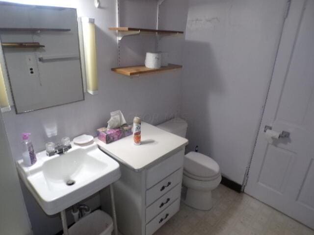 2343 Indianola Ave, Columbus, OH 43202 - bathroom featuring toilet and tile patterned floors