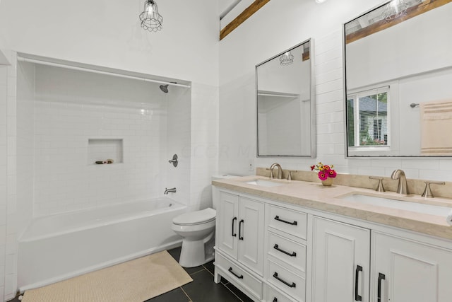 full bathroom with tiled shower / bath combo, tasteful backsplash, tile patterned floors, toilet, and vanity