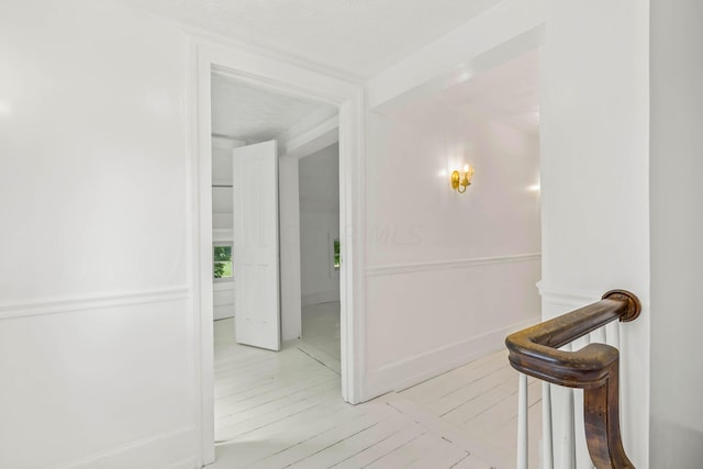 corridor featuring light wood-type flooring