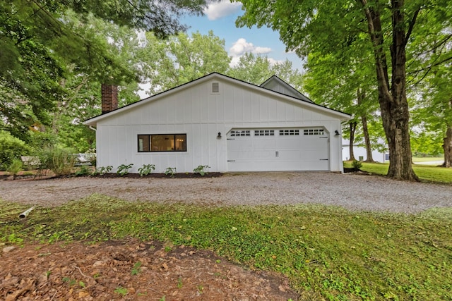 view of side of property featuring a garage