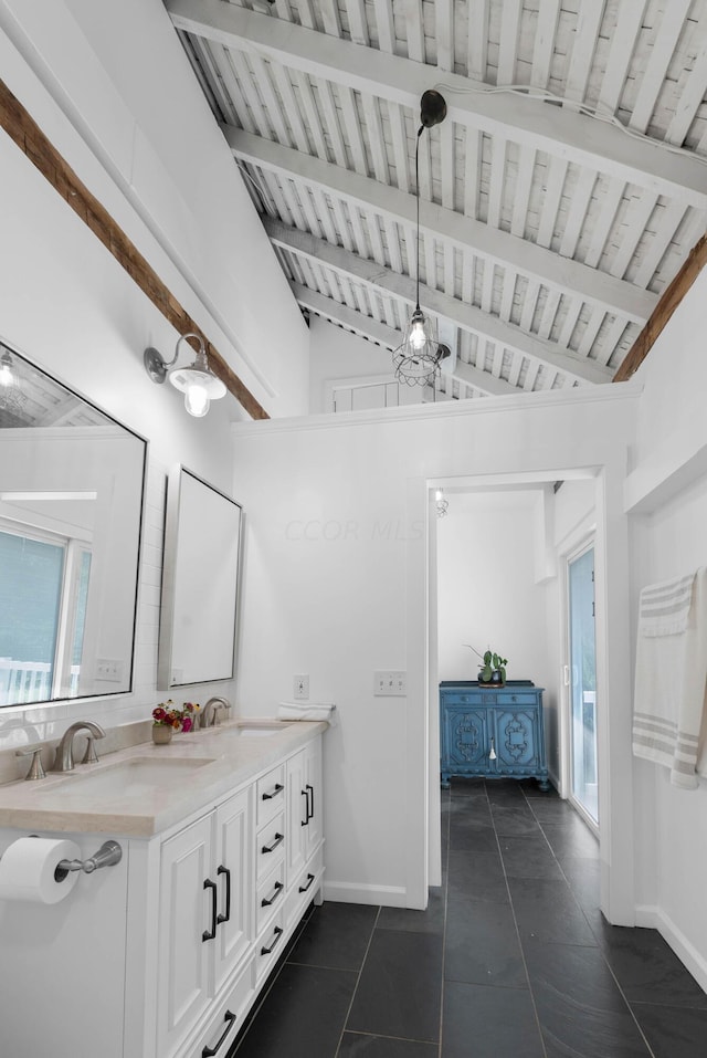 bathroom with wooden ceiling, an inviting chandelier, vaulted ceiling with beams, tile patterned flooring, and vanity