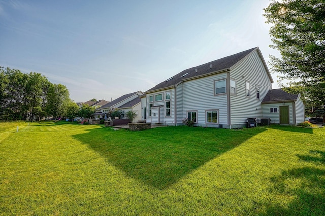 7265 Bromfield Dr, Canal Winchester, OH 43110 - back of house featuring a lawn