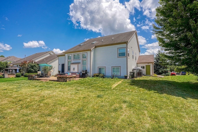7265 Bromfield Dr, Canal Winchester, OH 43110 - back of house with a patio area and a lawn