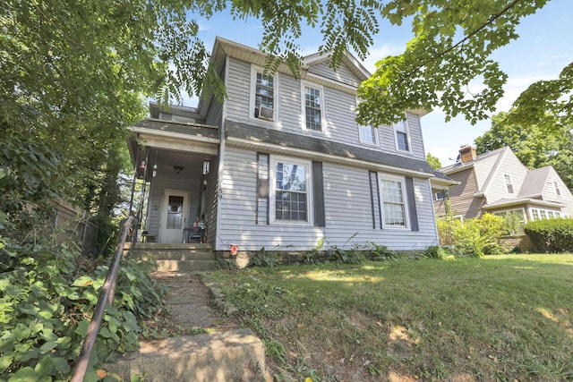 view of front facade with a front lawn