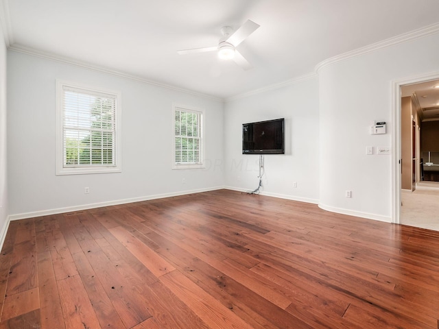 unfurnished living room featuring ceiling fan, light hardwood / wood-style floors, and ornamental molding