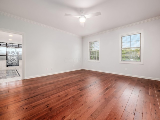 unfurnished room featuring hardwood / wood-style floors, ceiling fan, and ornamental molding